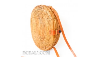 Oval rattan handbag ata hand woven leather handle 